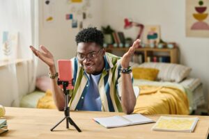 Blogger using online broadcasting t talk with followers