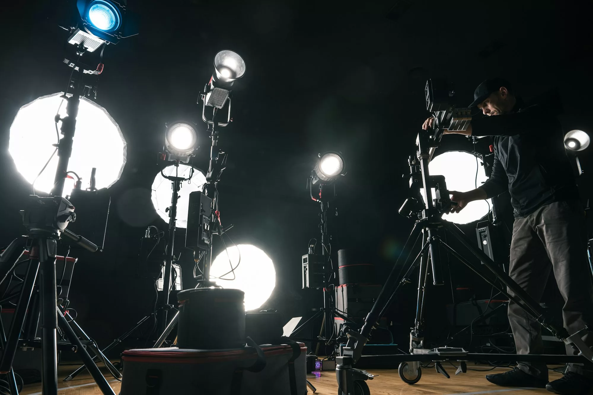 8 Media Group crew adjusting camera and lighting on a DC video shoot