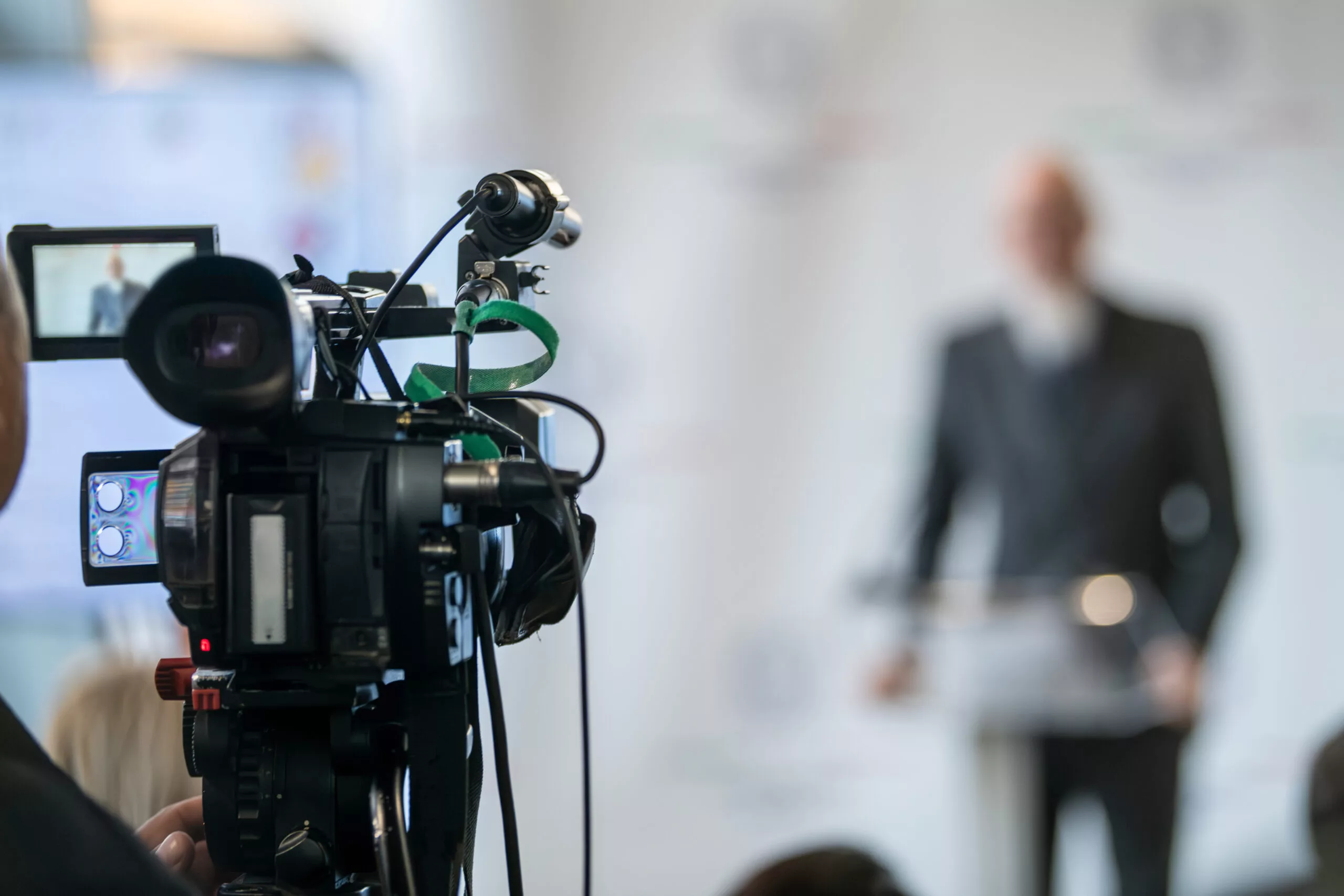Corporate event speaker on stage during a DC conference keynote