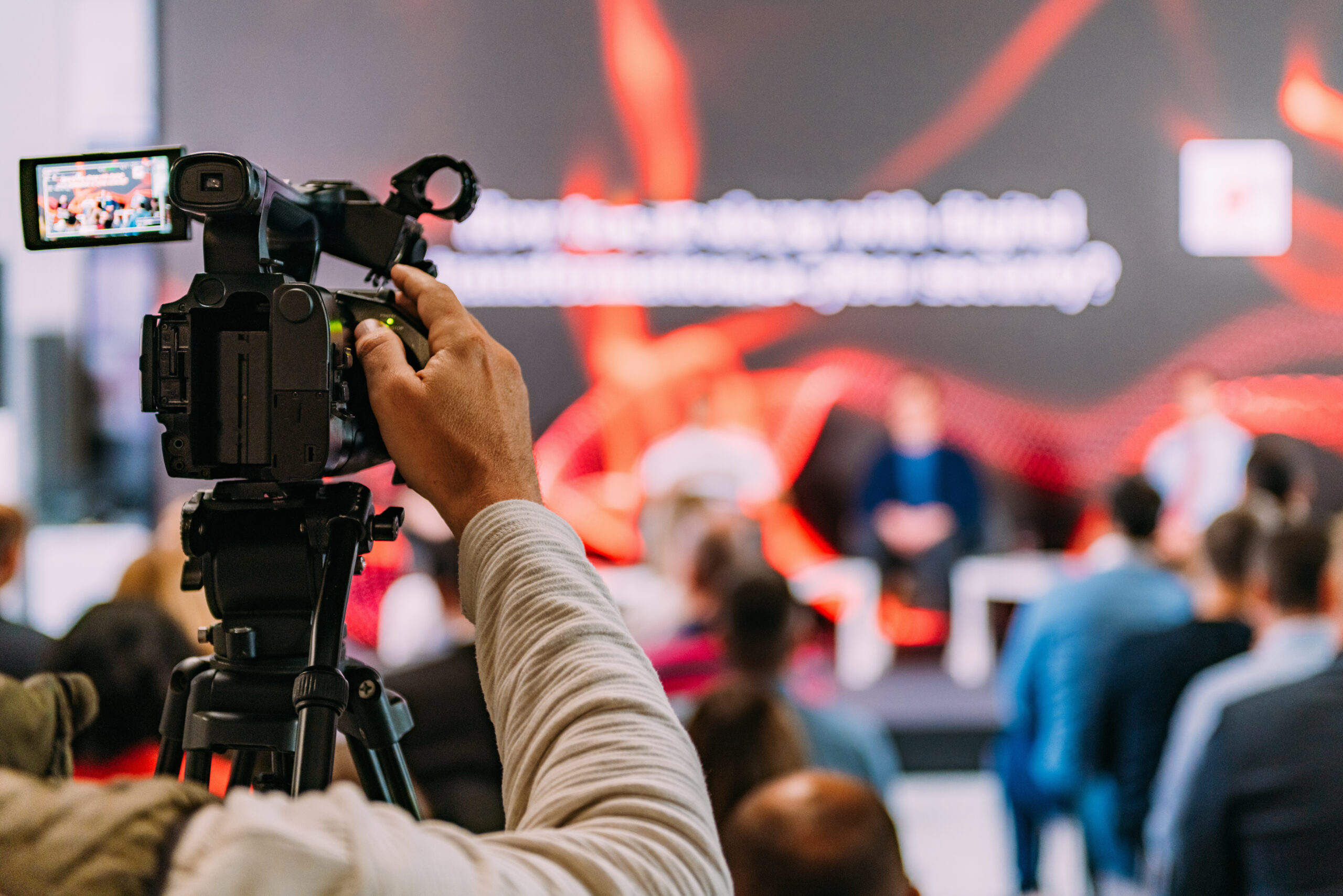Filming a business presentation with a live audience at a Washington, DC conference