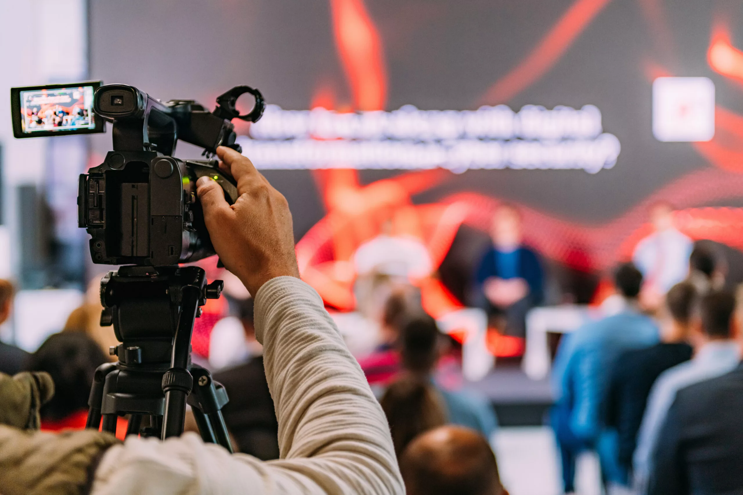Filming a business presentation with a live audience at a Washington, DC conference